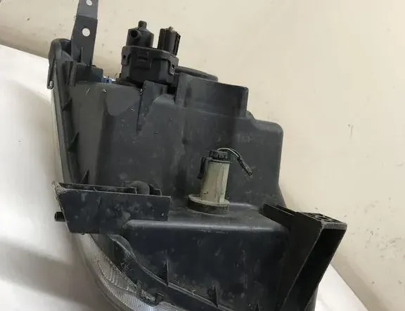 SUZUKI Ignis 2 generation (2003-2008) Faro delantero izquierdo 35398716